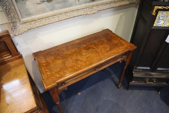 A Victorian Gothic revival walnut and marquetry rectangular card table, in the manner of Lamb of Manchester, W.3ft 2in.